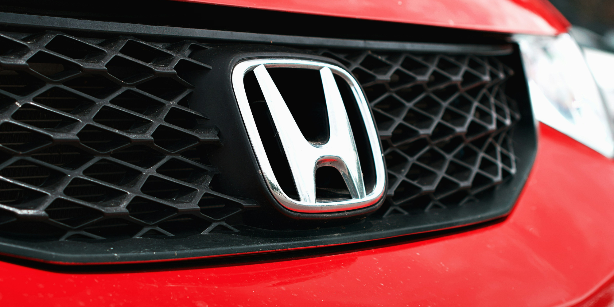 Logotipo de la agencia de autos número uno